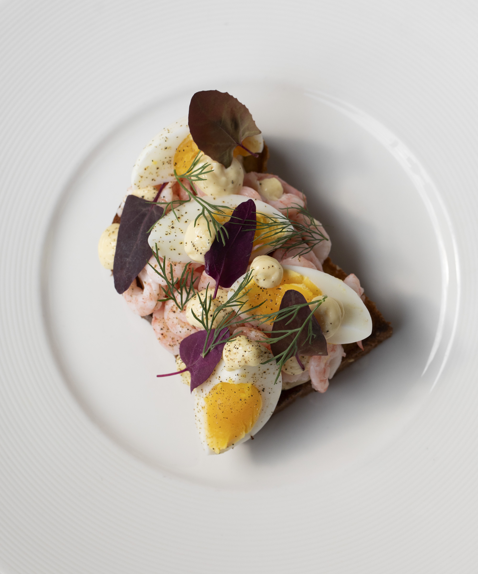 Pick any two smørrebrød at Sans Souci – With chef Christoffer Brink leading the kitchen, this Frederiksberg institution has established itself among the smørrebrød elite